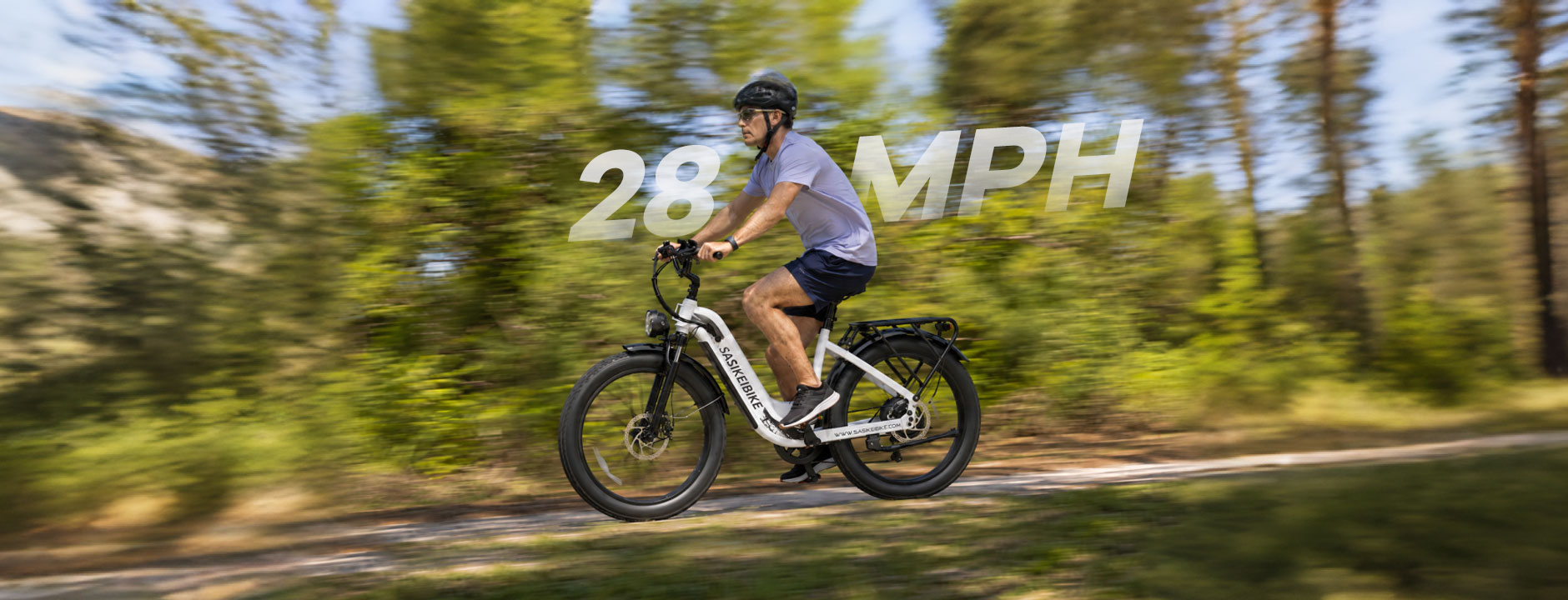 SASIKEIBIKE C6 electric fat tire bike splashing through coastal water during a summer ride